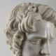 Bust of a Roman emperor in white marble, Italy, 20th century.