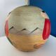 Ceramic table lamp representing women in hats on the sand.