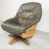 Brutalist oak and leather swivel chair, 1970s