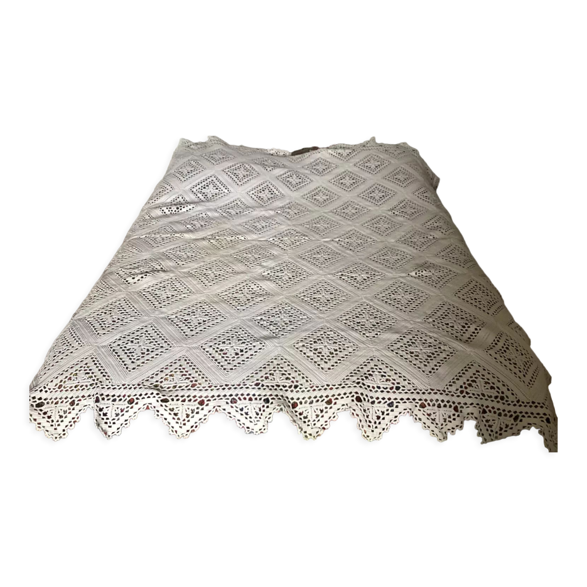 White cotton crochet bedspread with diamonds