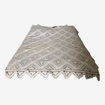 White cotton crochet bed cover with diamonds