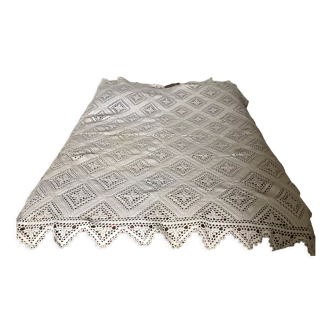 White cotton crochet bed cover with diamonds