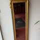 Mirror between two Louis XVI style in gilded wood with leaf around 1900