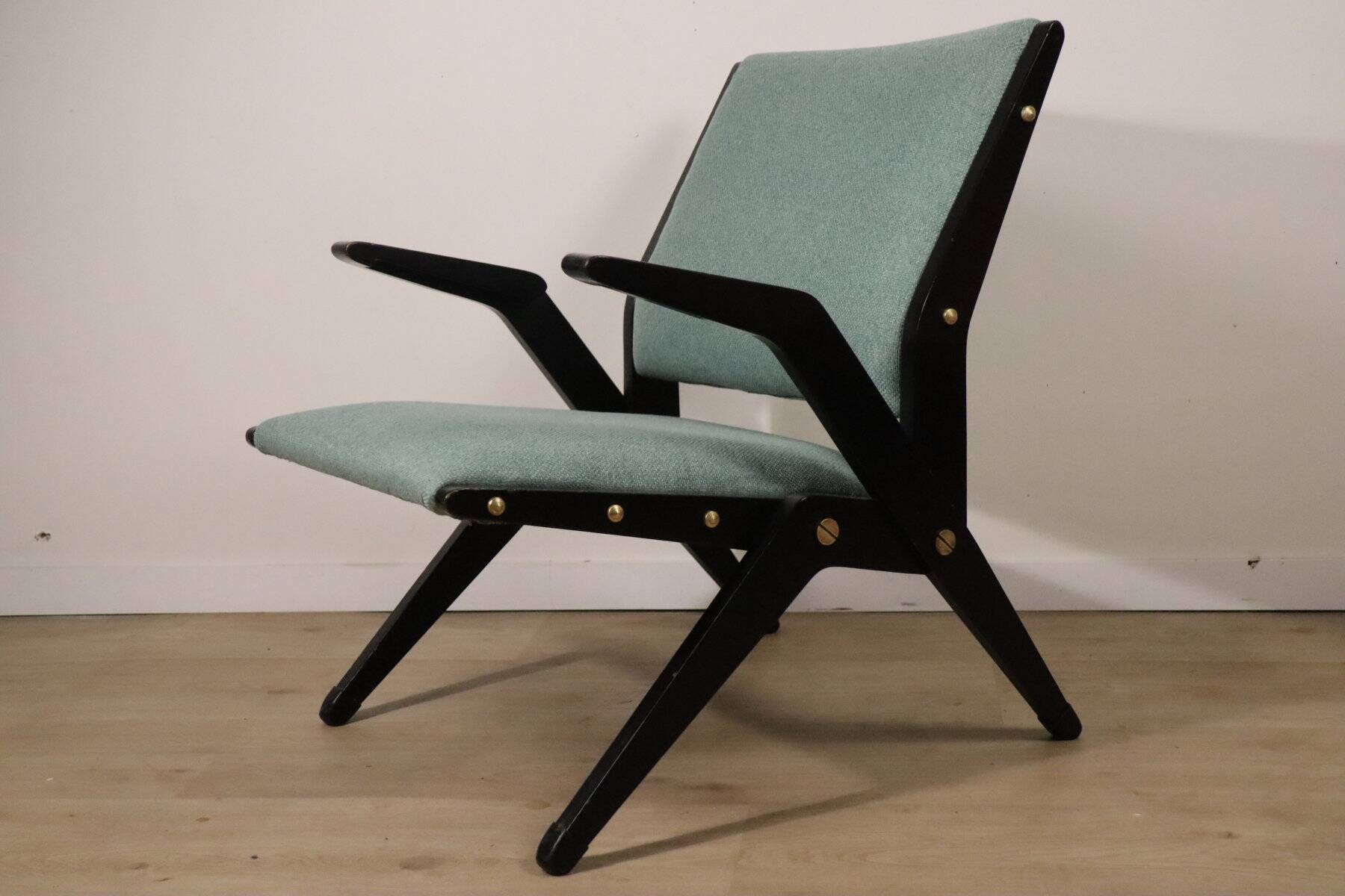 Vintage armchair from the 1960s in black wood and fabric.