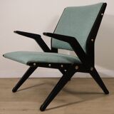 Vintage armchair from the 1960s in black wood and fabric.