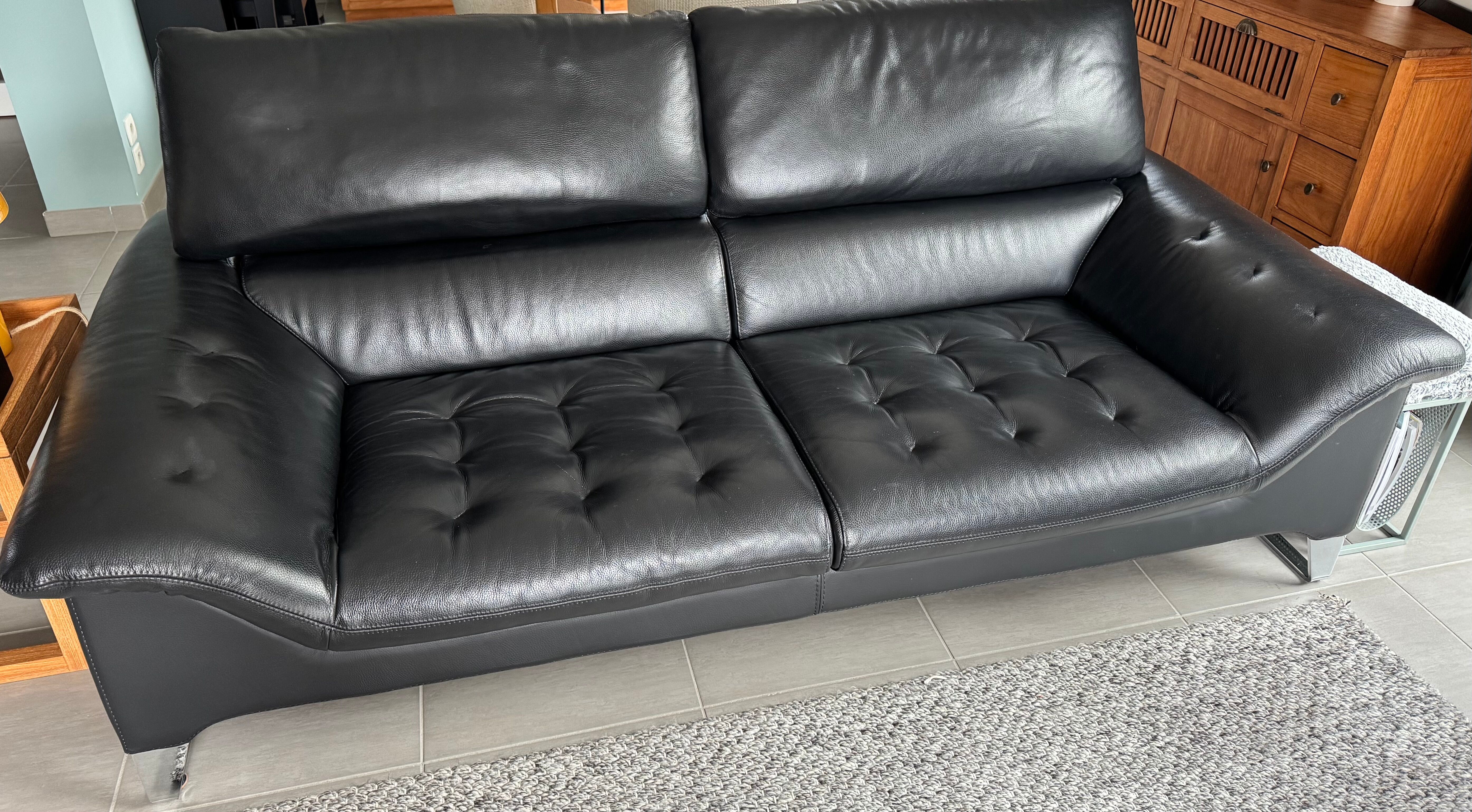 Two-seater black leather sofa Roche Bobois