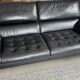 Two-seater black leather sofa Roche Bobois