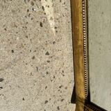 Golden mirror style Restoration decorated with stretched palmettes