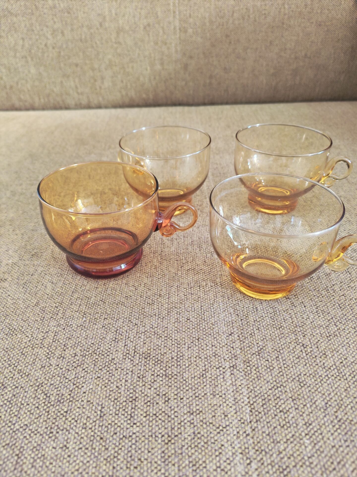 Set of four vintage amber glass cups