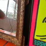 Golden trumeau mirror for fireplace, late 19th century, with sculpted pediment.