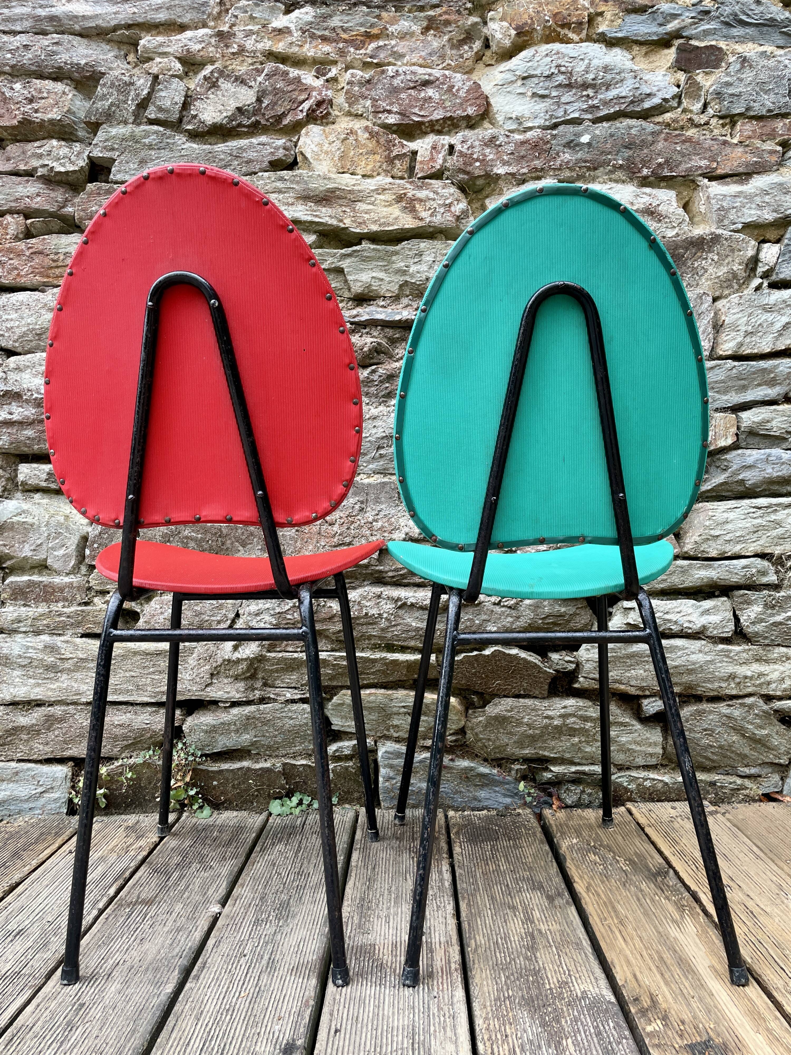 Pair of faux leather chairs from the 1950s/60s.