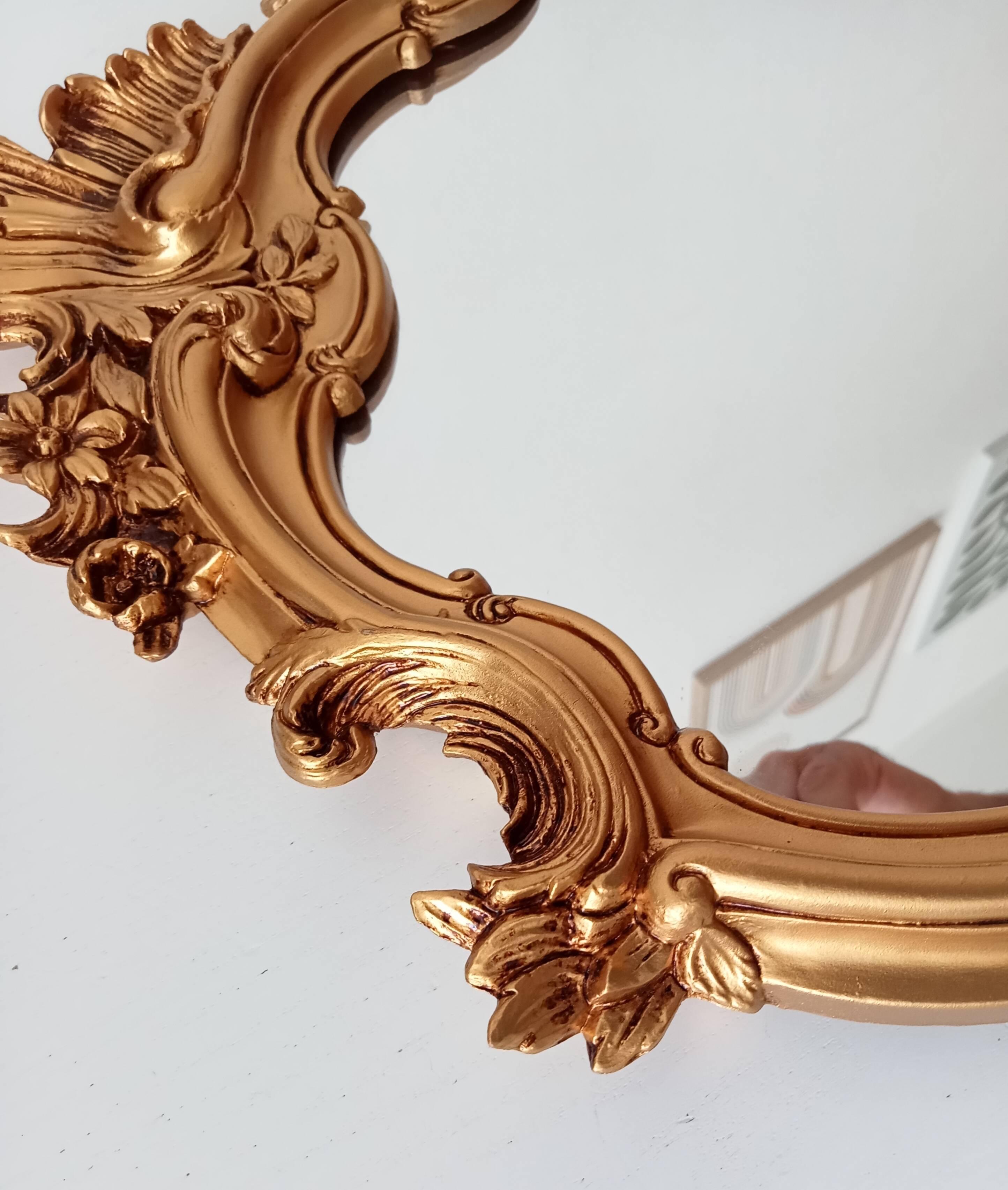Vintage rococo mirror in gilded resin