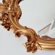 Vintage rococo mirror in gilded resin