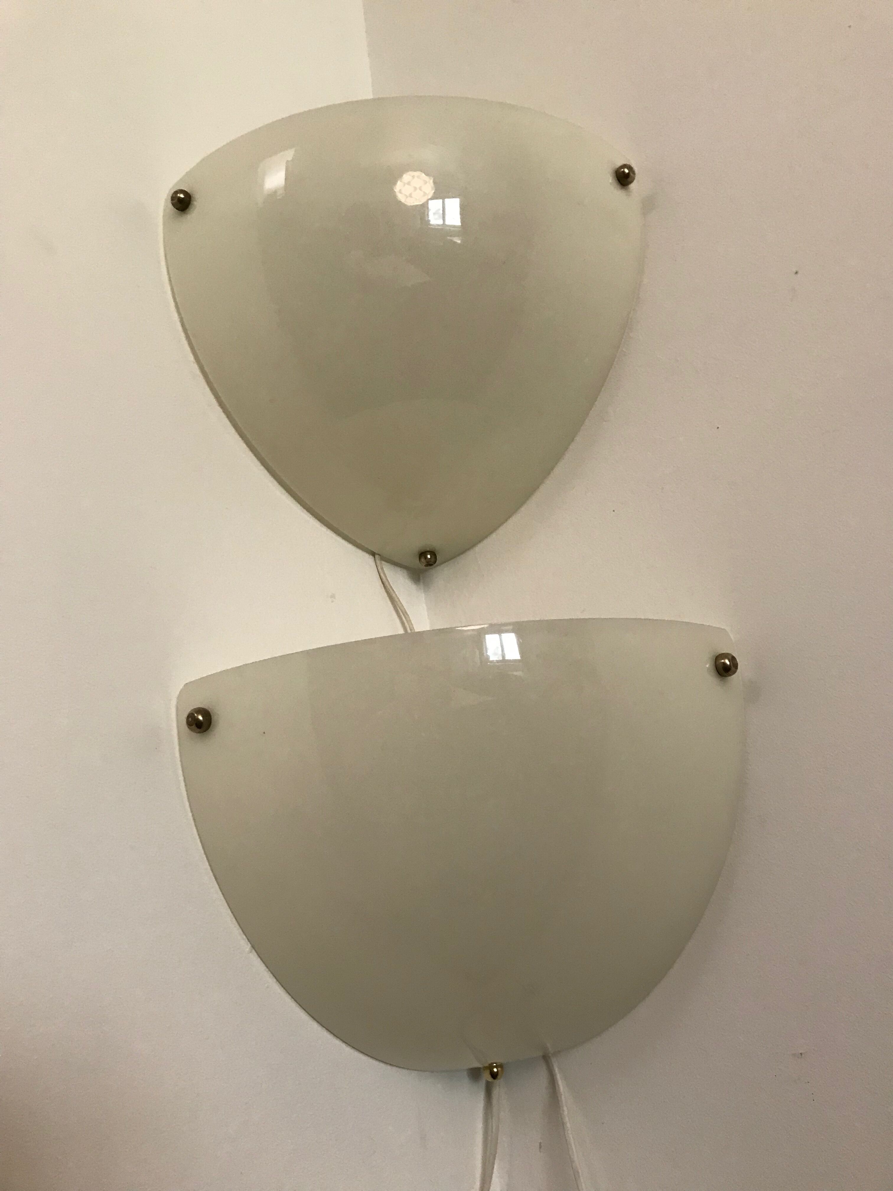 Duo of plastic corner sconces