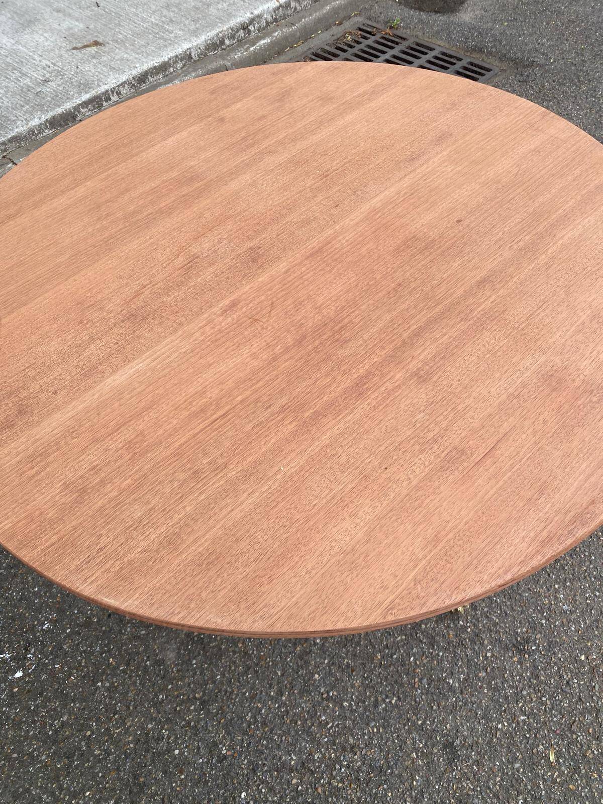 Round extendable dining table in solid mahogany from the 1930s.