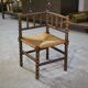 Pair of turned wooden corner chairs from the 1950s.