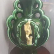 Earthenware vase with 3 caryatids