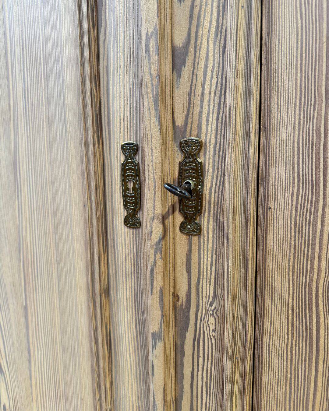 Small antique wardrobe in solid pitch pine.