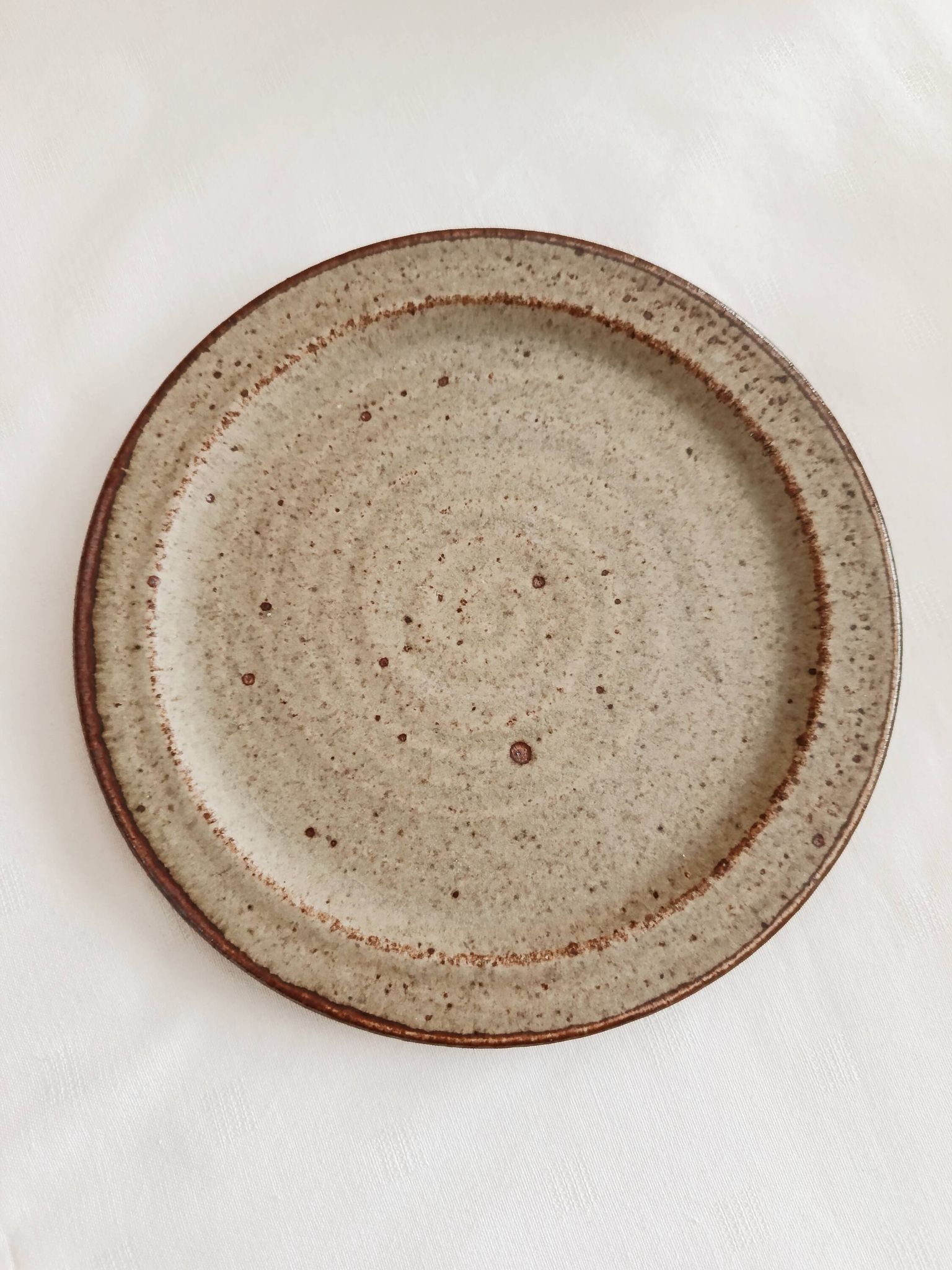 Set of 5 dessert plates by Jean Tessier, Le Cep, in pyrite stoneware.