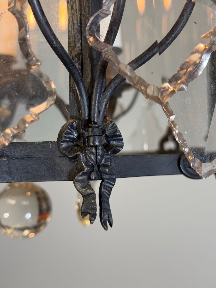 Louis XV style lantern in blackened brass adorned with cut crystal pendants, circa 1900.