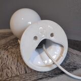 White ceramic hand sconce with white opaline globe