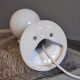 White ceramic hand sconce with white opaline globe