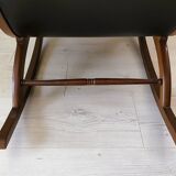 Black leather rocking Chesterfield armchair