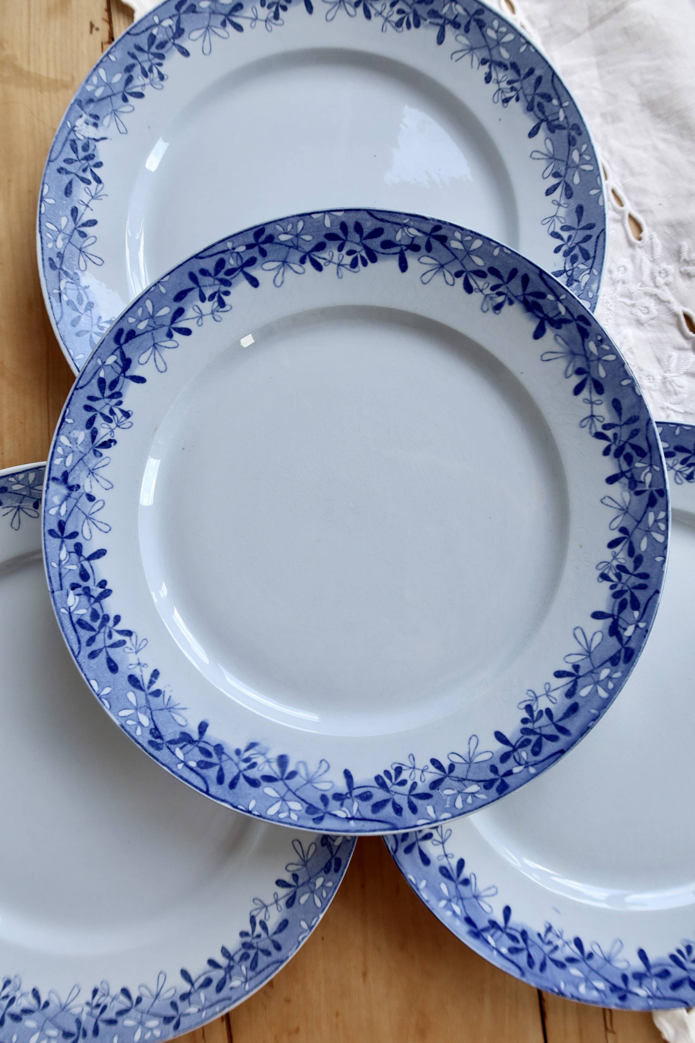 4 antique flat plates from Sarreguemines U&C in the Mimosa blue pattern.