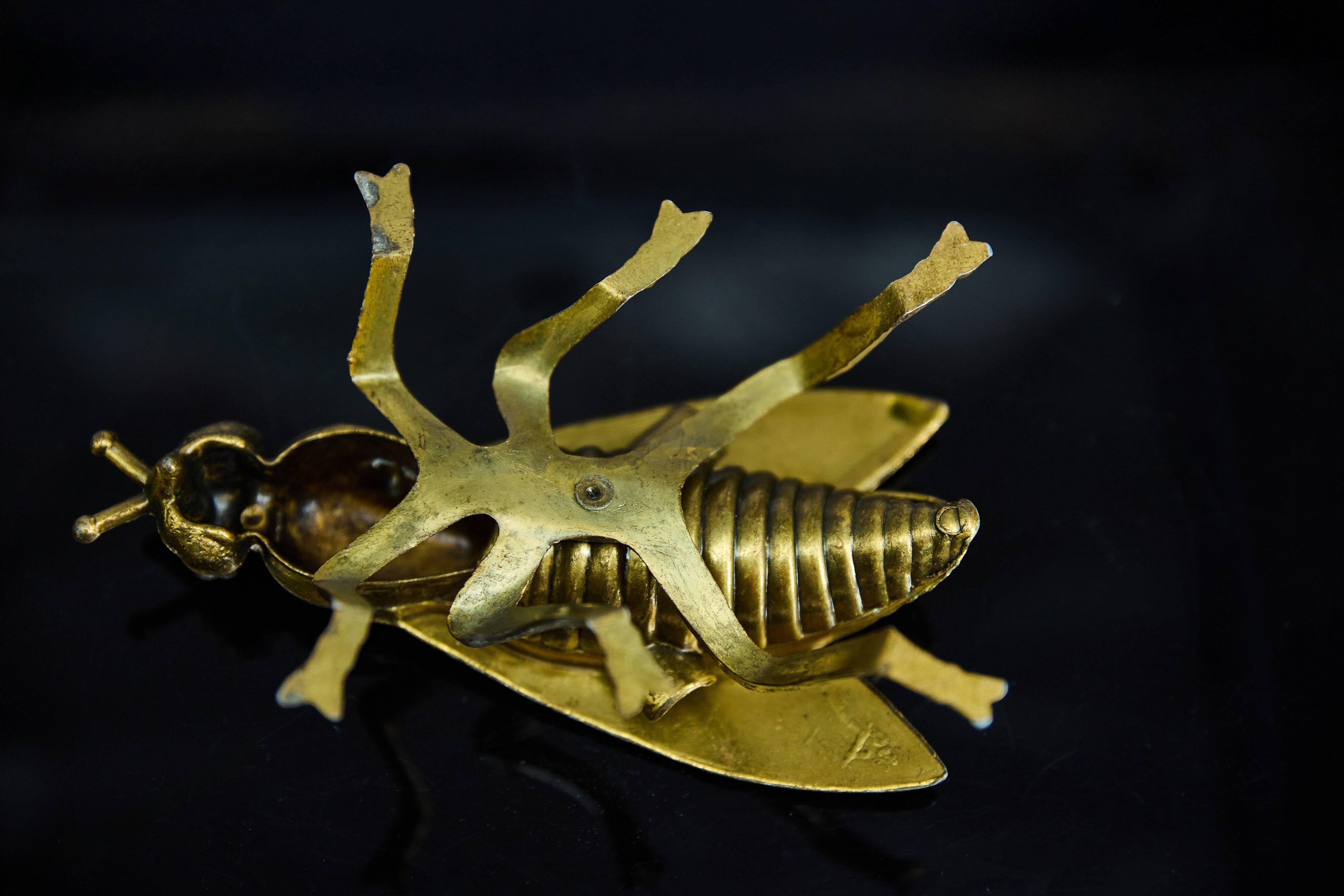 Sculptural ashtray in the shape of a giant fly in brass, Italy, circa 1950.