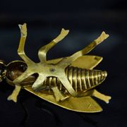 Sculptural ashtray in the shape of a giant fly in brass, Italy, circa 1950.