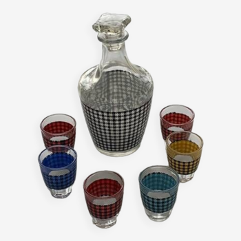 Liquor service consisting of a carafe and 6 small shot glasses, vintage houndstooth pattern