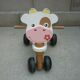 Vache porteur trotteur en bois