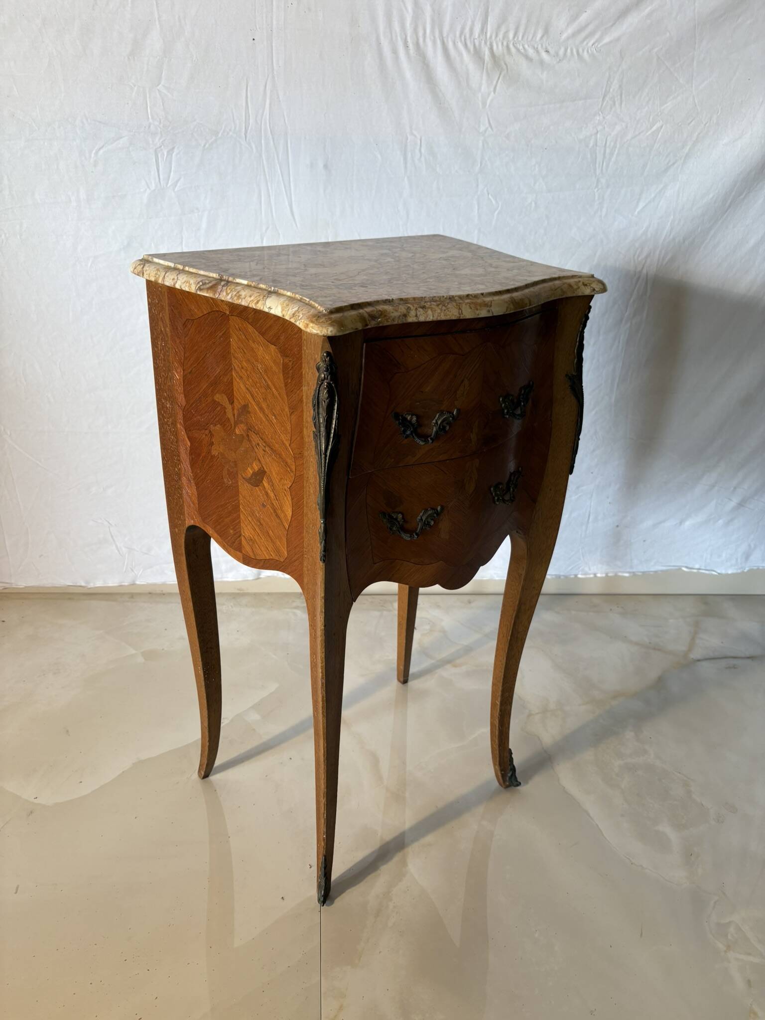 Small curved Louis XV style piece of furniture – marquetry and marble top