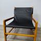 Leather and teak armchair