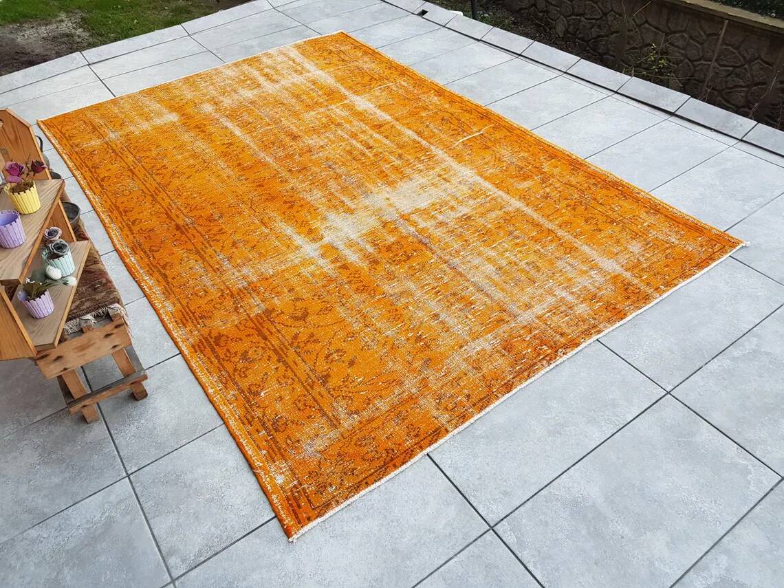 Tapis vintage orange surteint