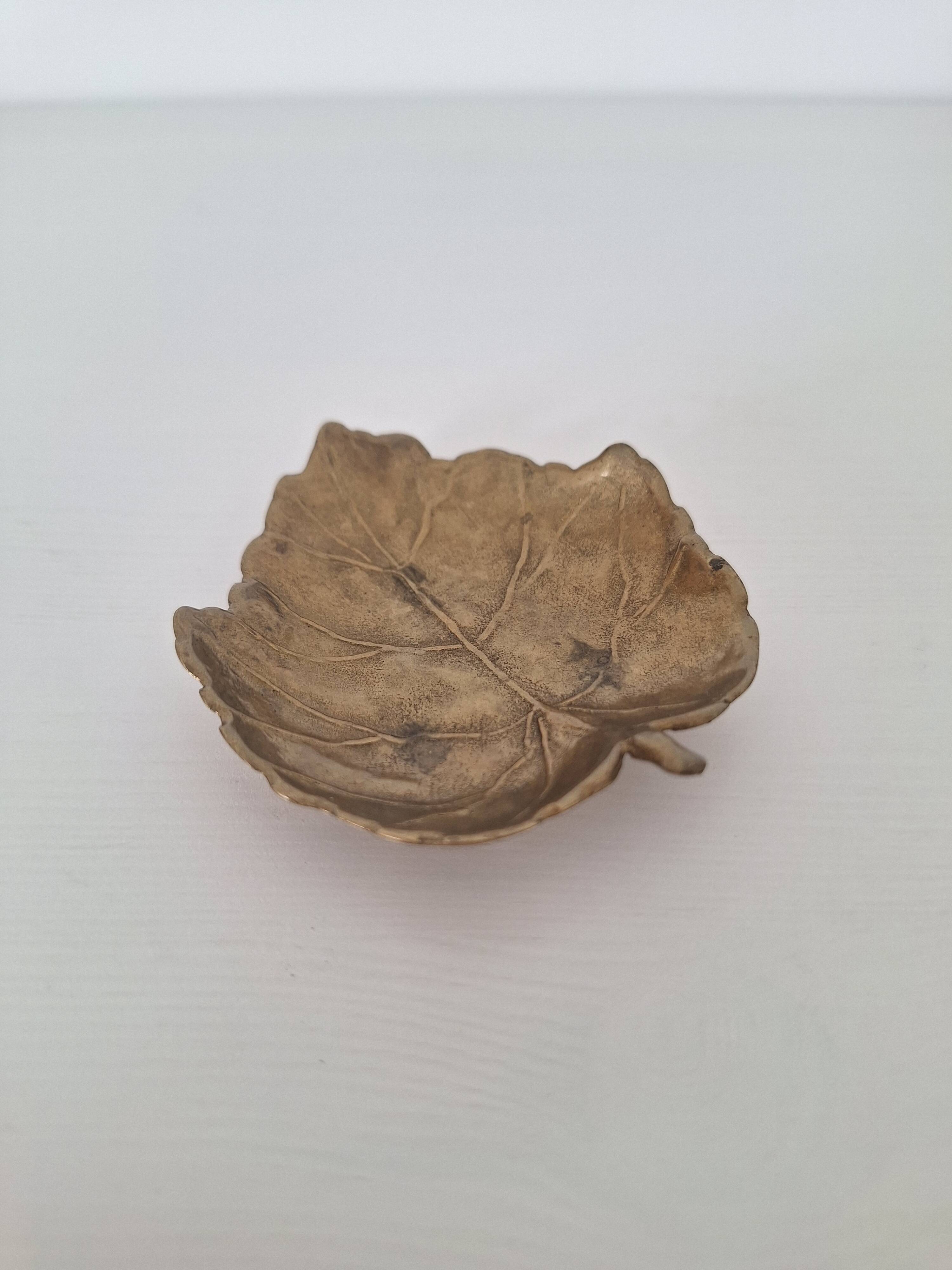 Vintage brass pocket emptier