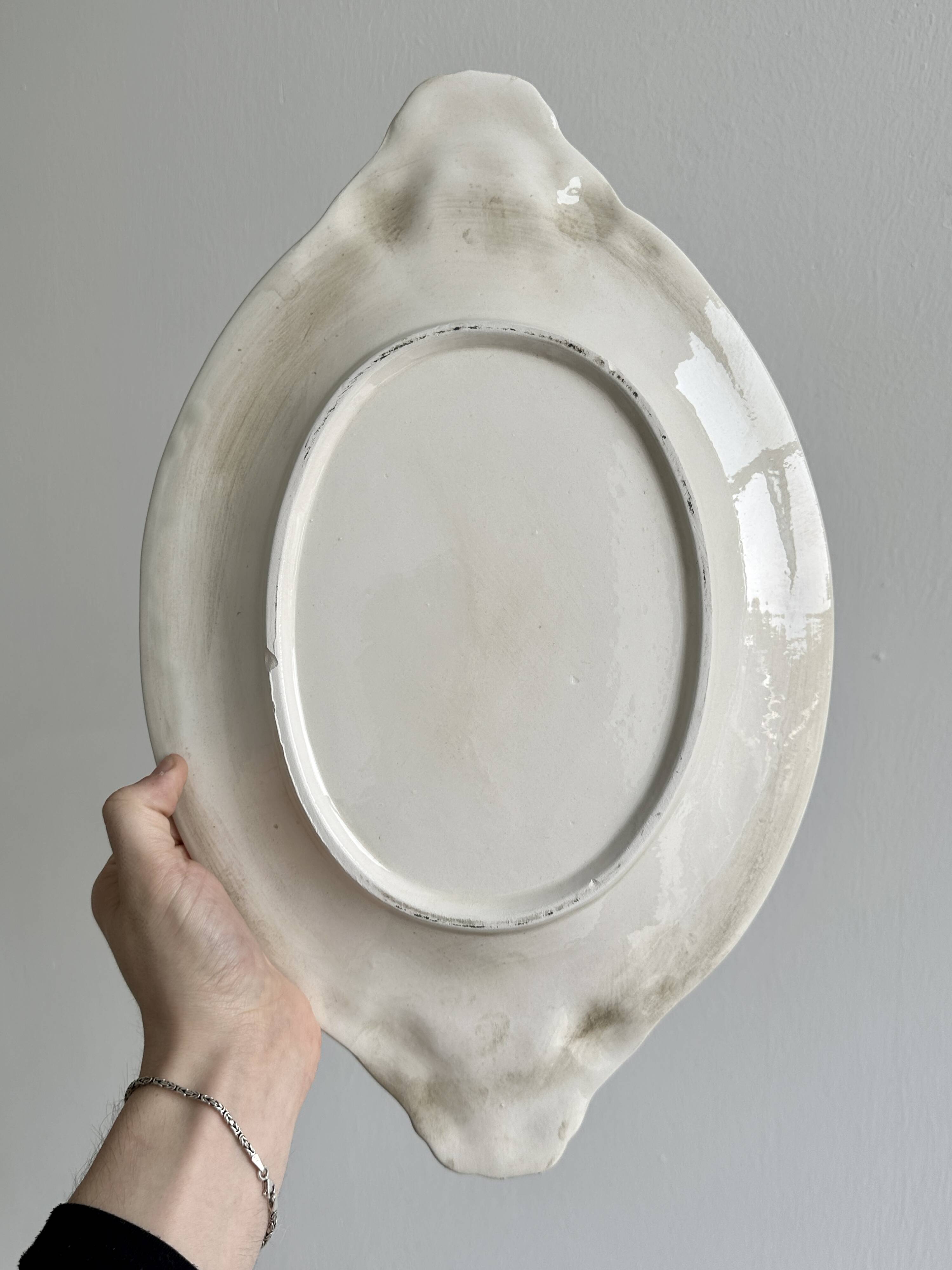 Large oval dish in sculpted white ceramic