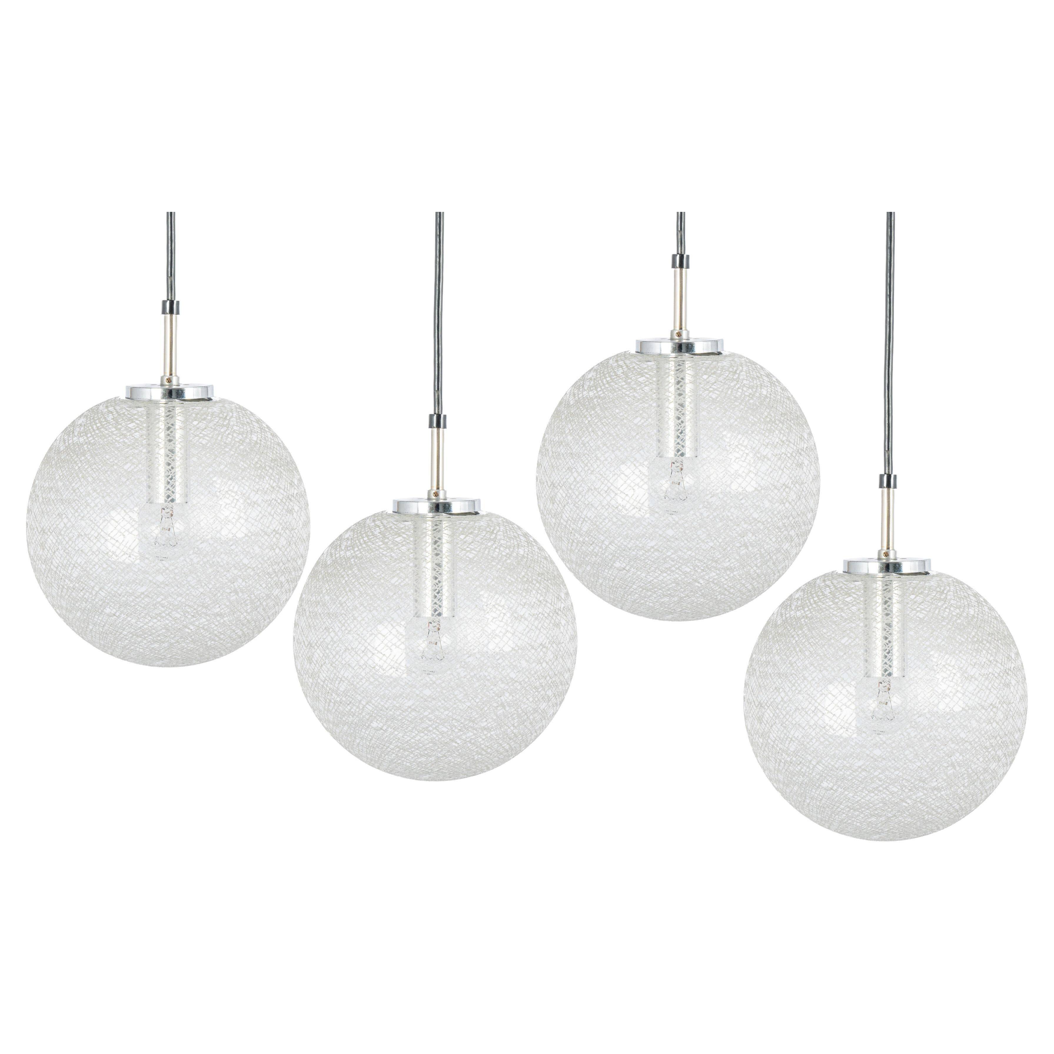 Small chrome Limburg pendant light with glass ball, Germany, 1970s.