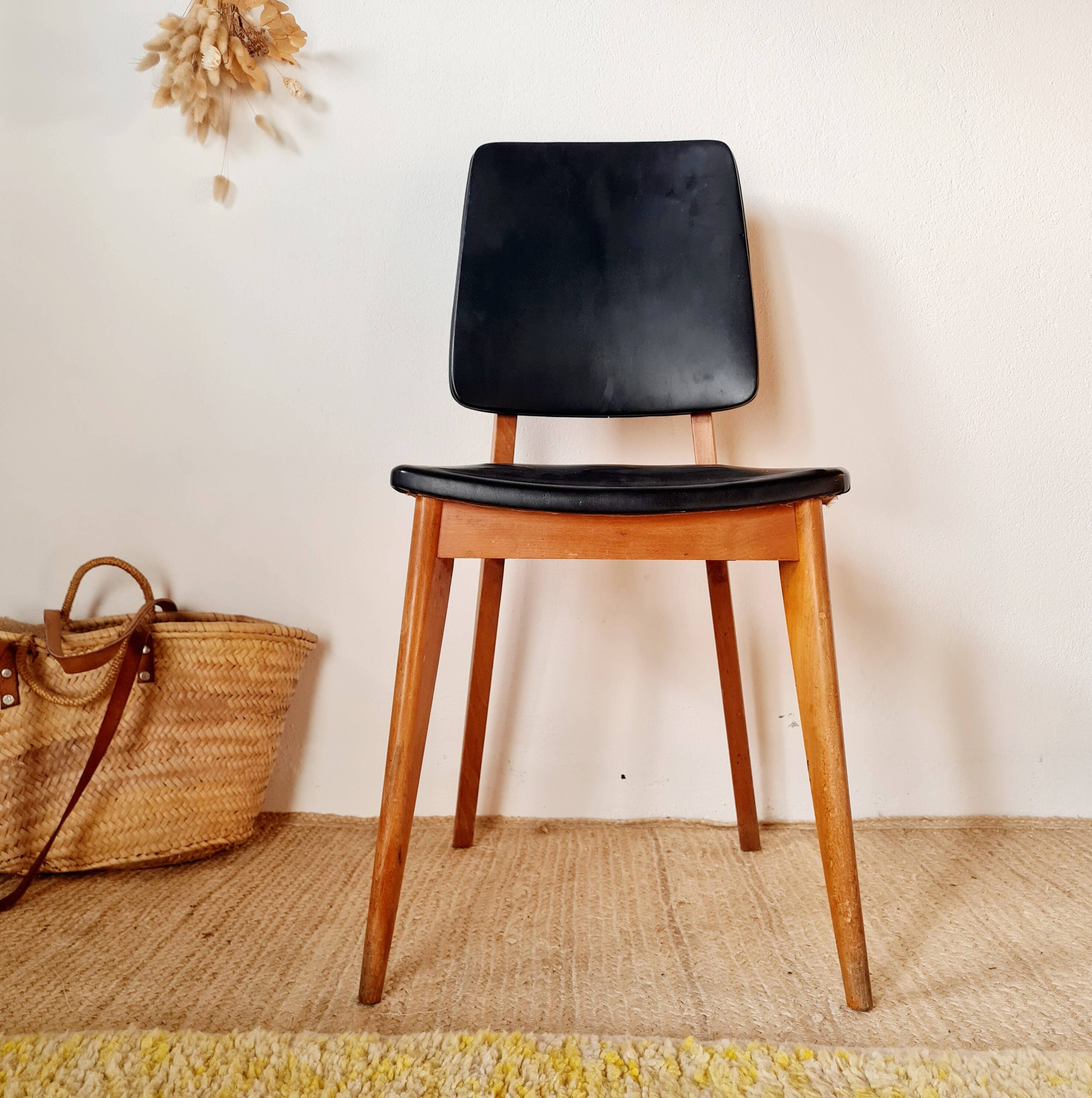 Vintage Scandinavian chair with compass legs.