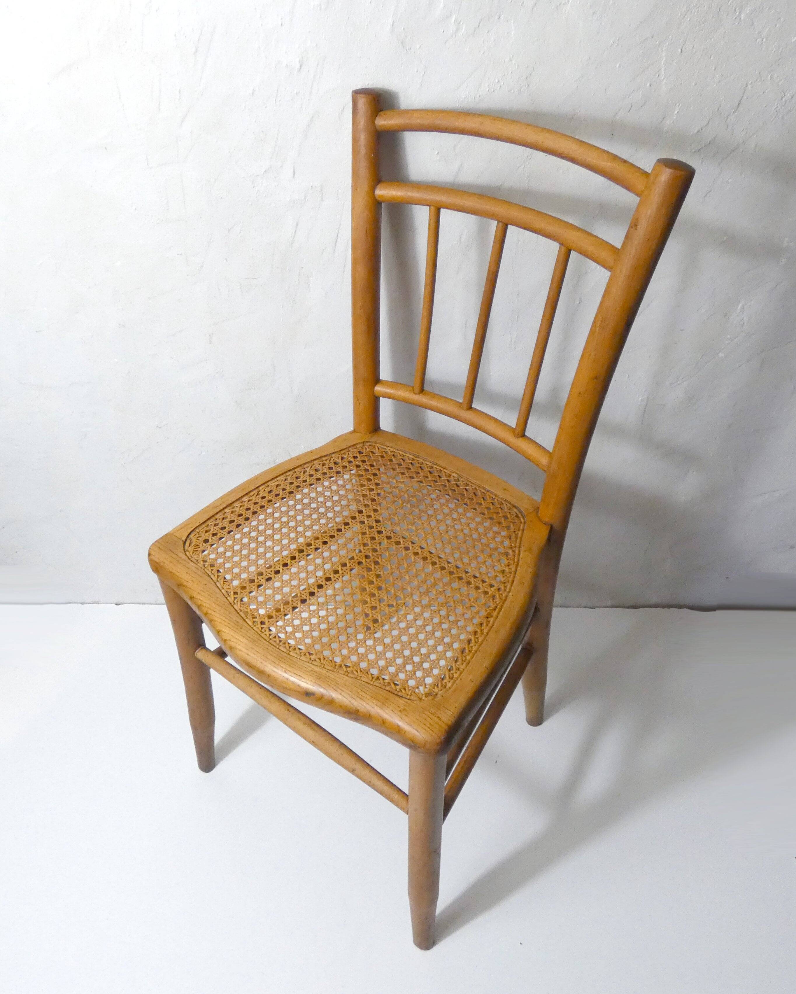 vintage wooden bistro chair with caning