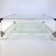 Coffee table in plexiglass, brass and glass top, 1980.