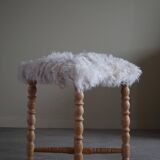 High oak stool, reupholstered in lambswool, Danish cabinetmaker, 1950s.