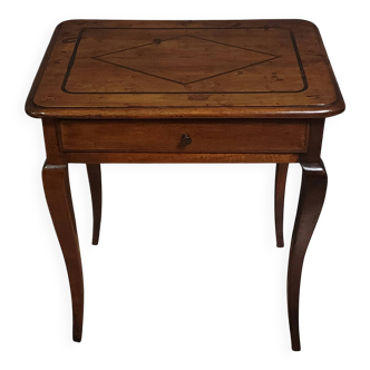 antique fruitwood display table, resting on four curved legs