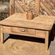 Large square farmhouse coffee table made of raw solid oak.