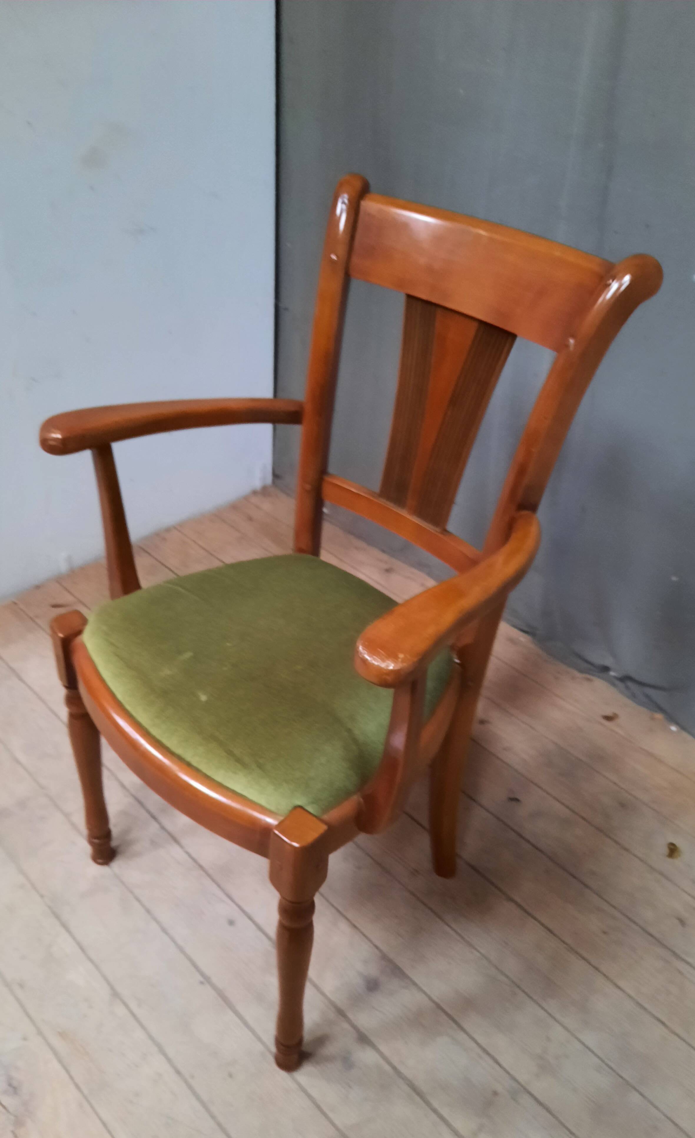 Modern armchair in varnished wood