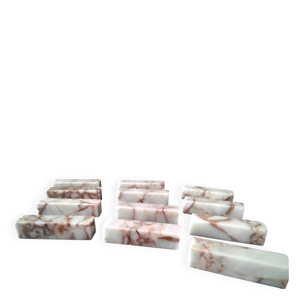 Coffret de 12 porte couteaux en marbre de couleur beige