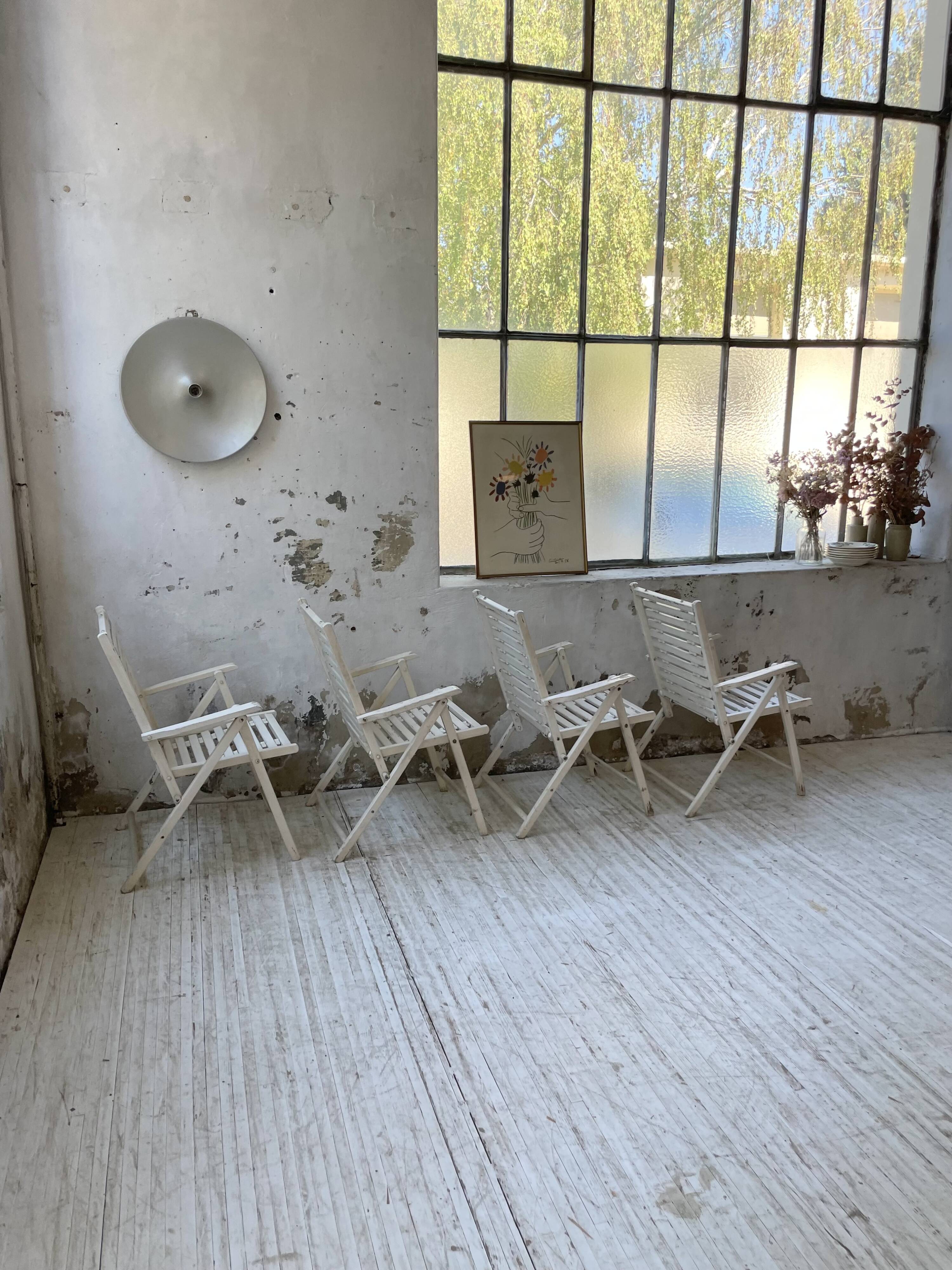 4 white wooden garden chairs