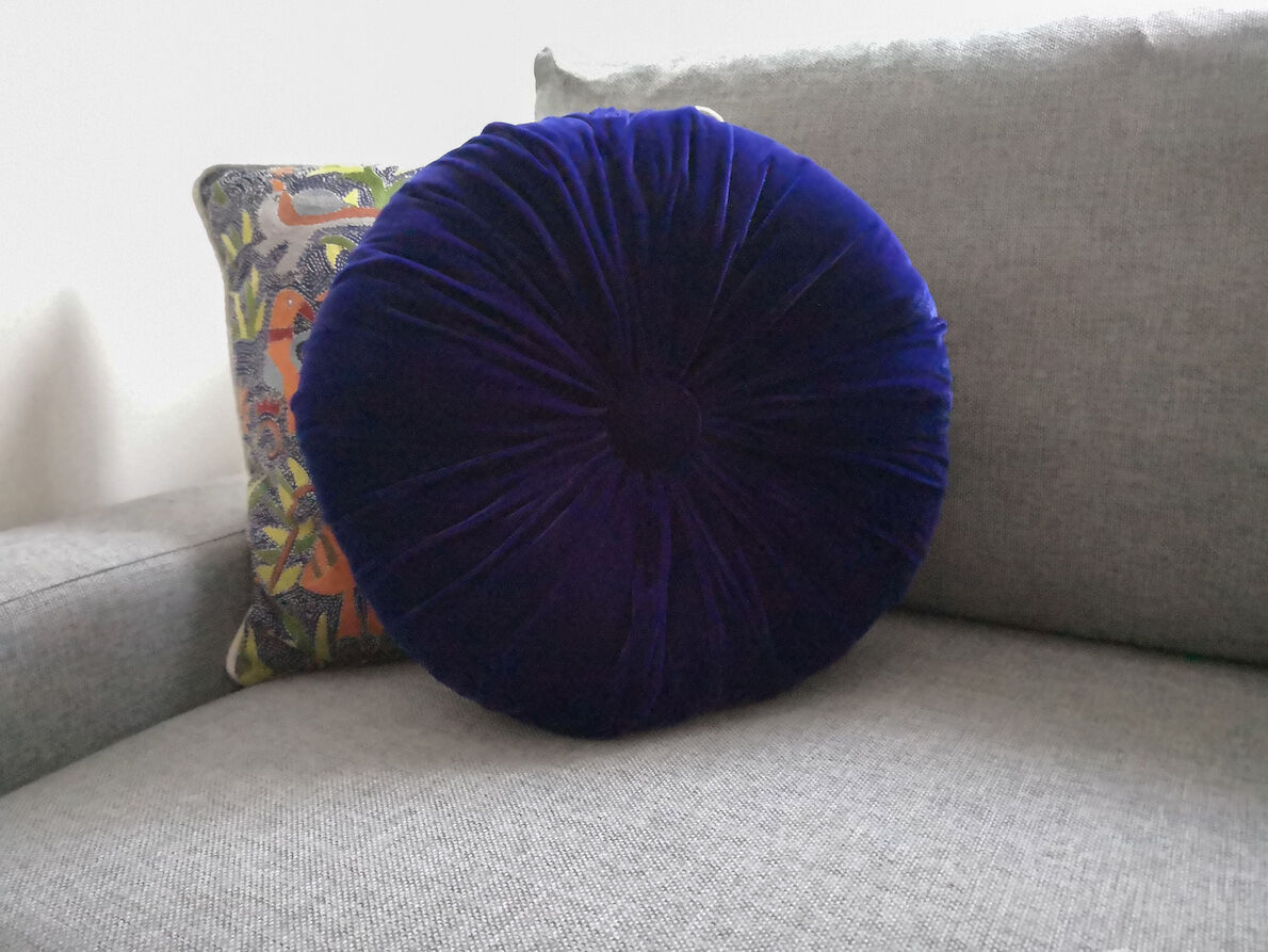 Dark blue round cushion