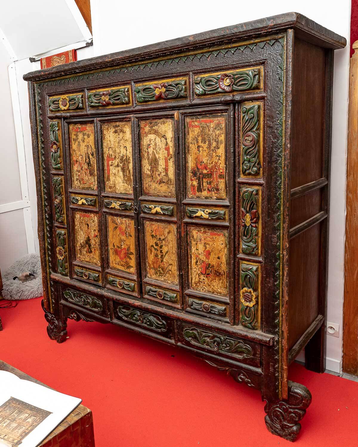 Antique Chinese wardrobe with 4 doors and 3 drawers.