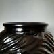 Vase or pot cover in the shape of a Moor's head made of glass from the 1970s.